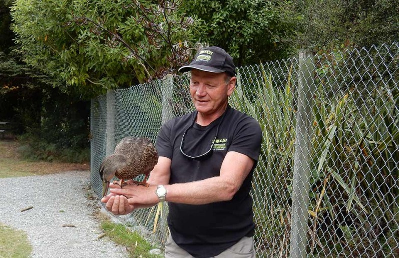 Guide Ken Dixon holding a duck